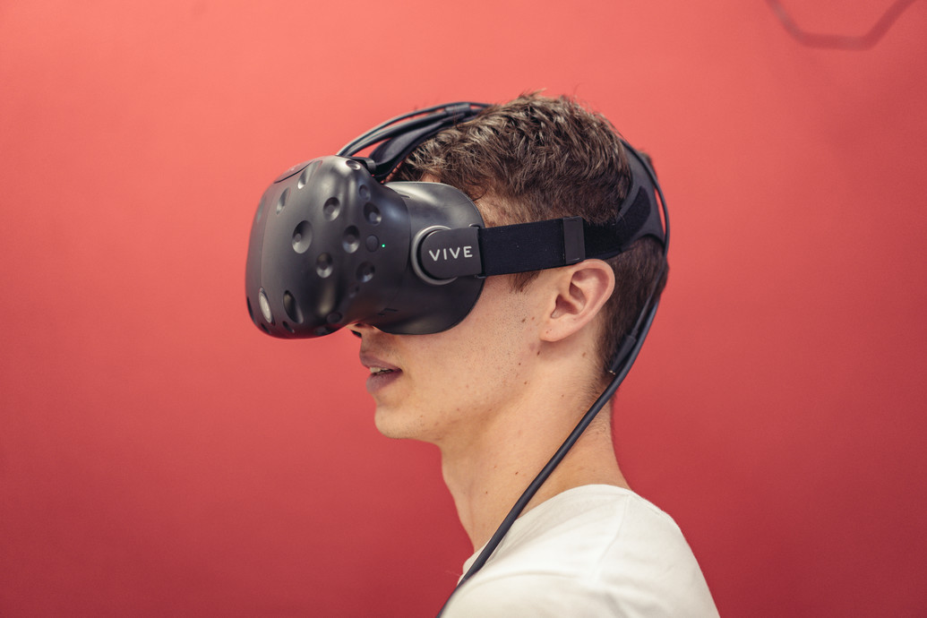 Psychology Student Virtual Reality (Red BG) Headshot