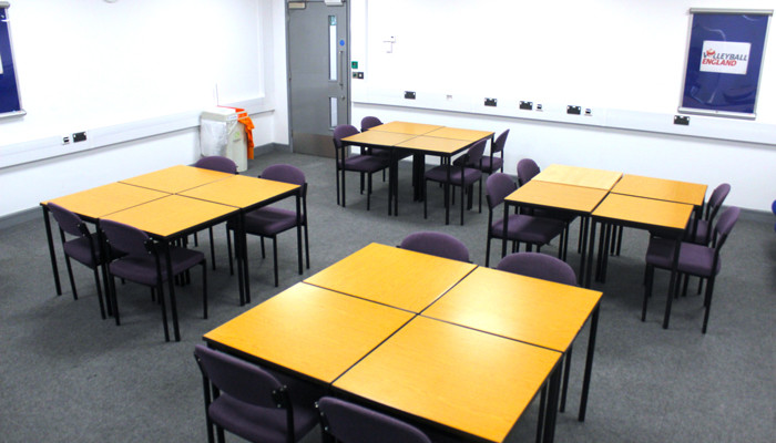 Ameachi room at UEL with four groups of four tables.