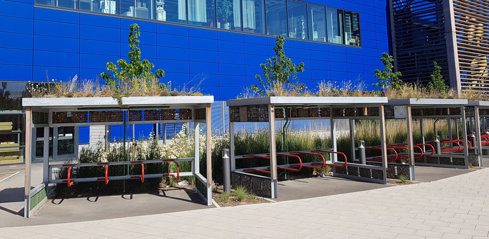 Green roof bicycle shelters outside of IKEA at North Greenwich, London, UK
