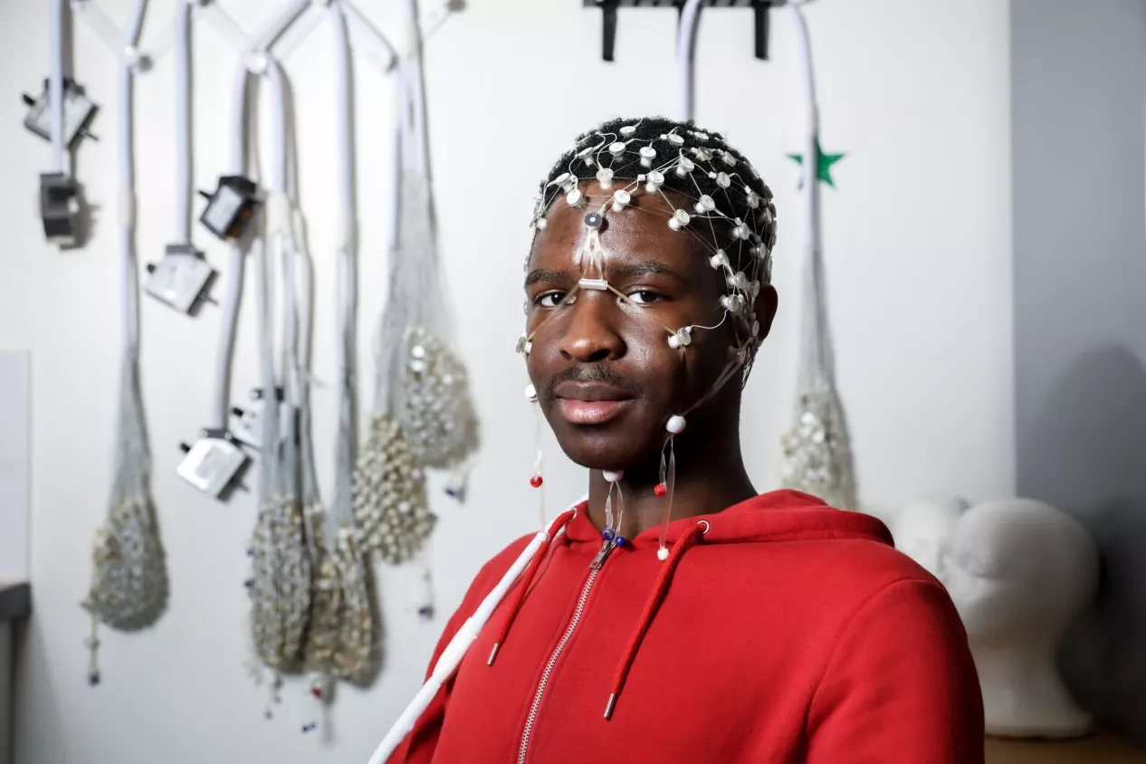 Man with electrodes on his head