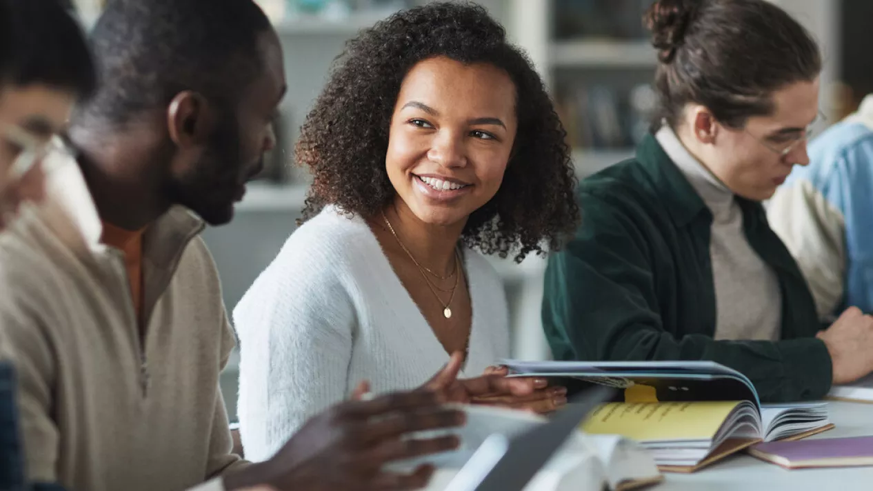 Girl smiling in a classroom