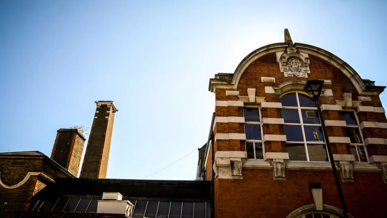 View of Stratford campus with blue sky behind it