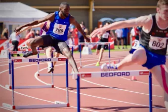 Athletes competing in a track event